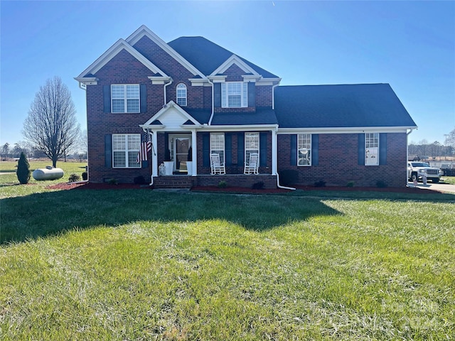 view of front of home featuring a front lawn