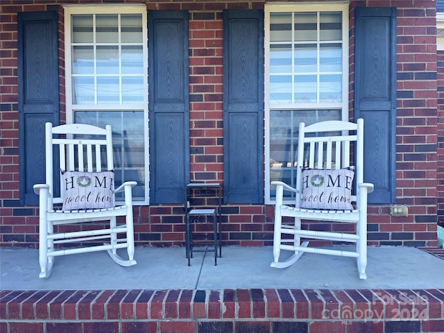 view of patio featuring a porch