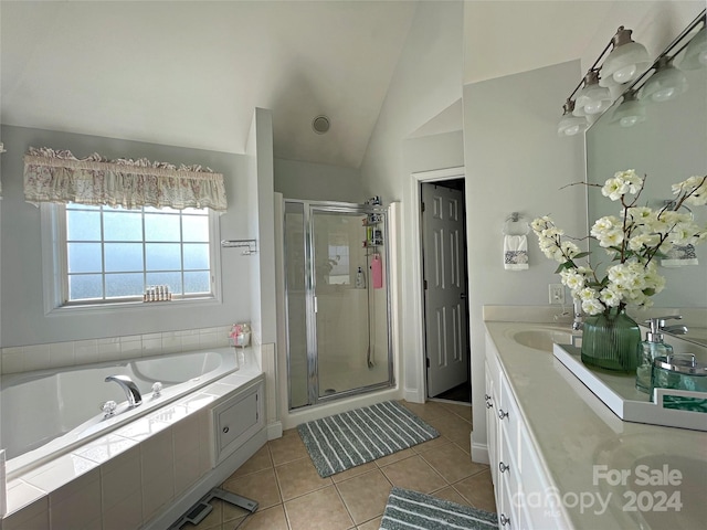 bathroom with separate shower and tub, tile patterned floors, vanity, and vaulted ceiling