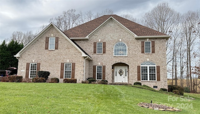 view of front of house with a front lawn