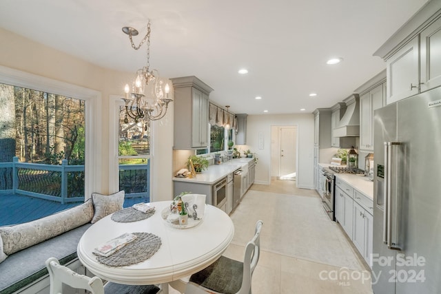 tiled dining area featuring a notable chandelier