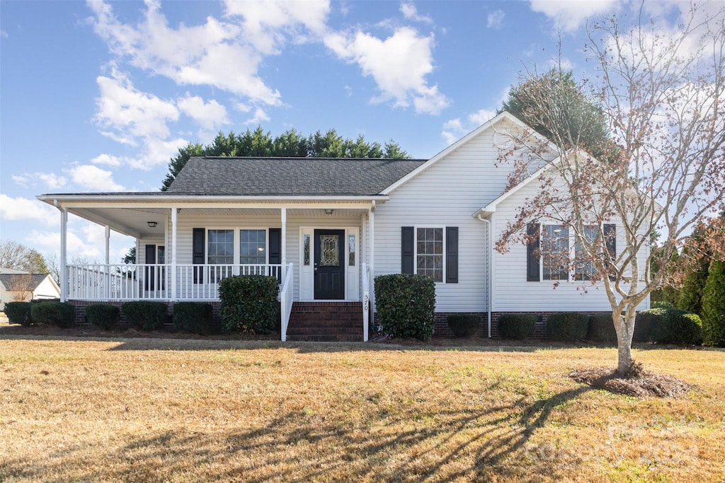 view of front of home with a front lawn and a porch