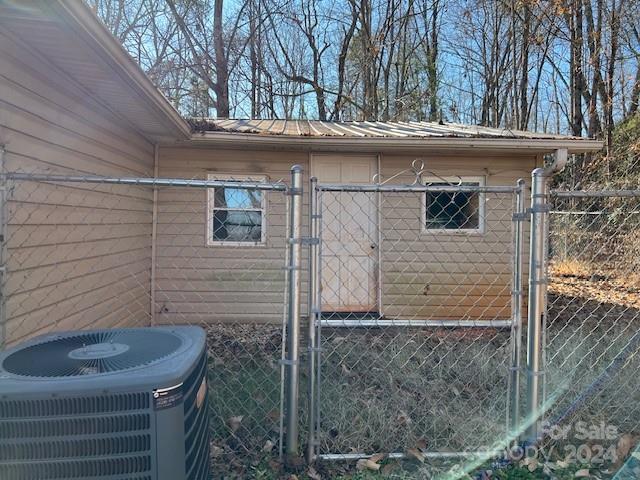 view of property exterior featuring central air condition unit