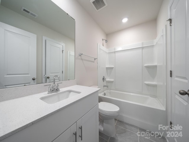 full bathroom featuring toilet, vanity, shower / bath combination, and tile patterned floors