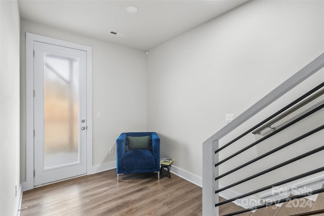 living area featuring hardwood / wood-style flooring