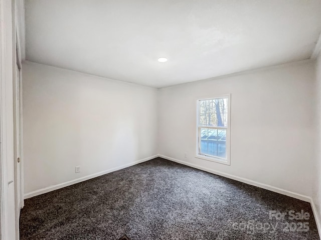 view of carpeted spare room