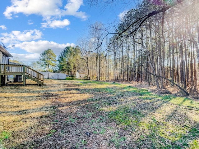 view of yard featuring a deck