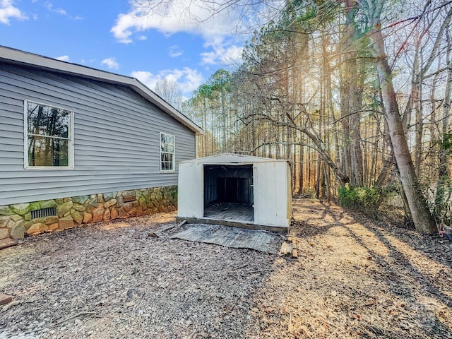 entry to storm shelter with a storage unit