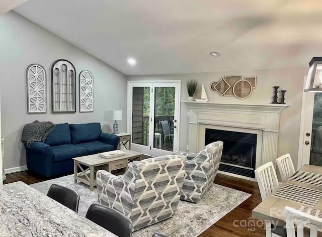 living room with dark hardwood / wood-style floors