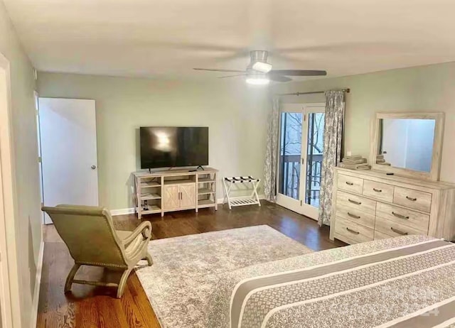 bedroom with access to exterior, dark hardwood / wood-style flooring, and ceiling fan