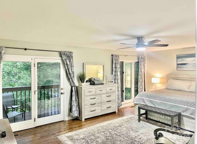 bedroom with access to outside, ceiling fan, and dark hardwood / wood-style flooring