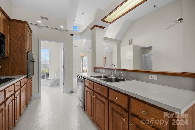 kitchen with ceiling fan, sink, high vaulted ceiling, and black appliances