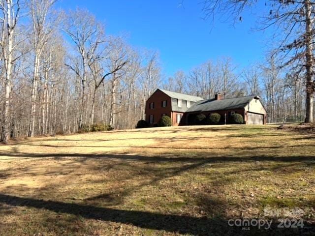 view of side of property with a garage