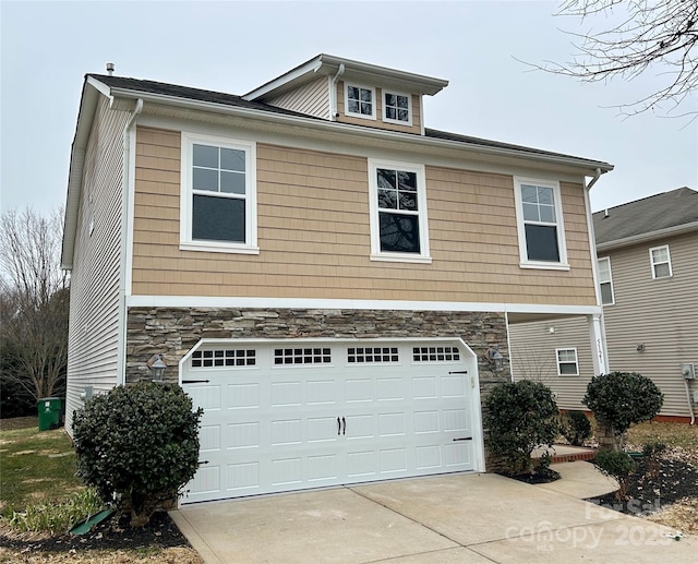 view of front of house with a garage