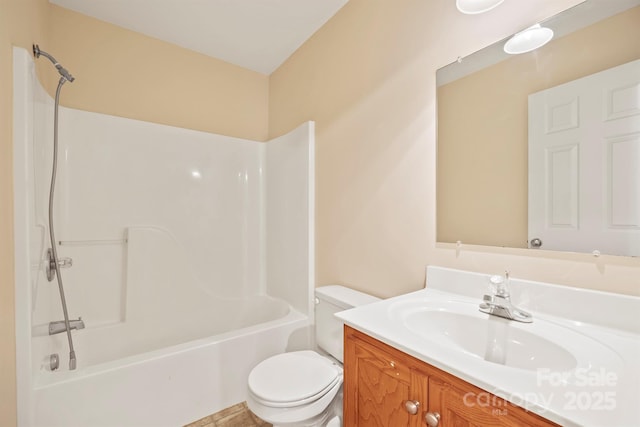 full bathroom with shower / tub combination, vanity, and toilet