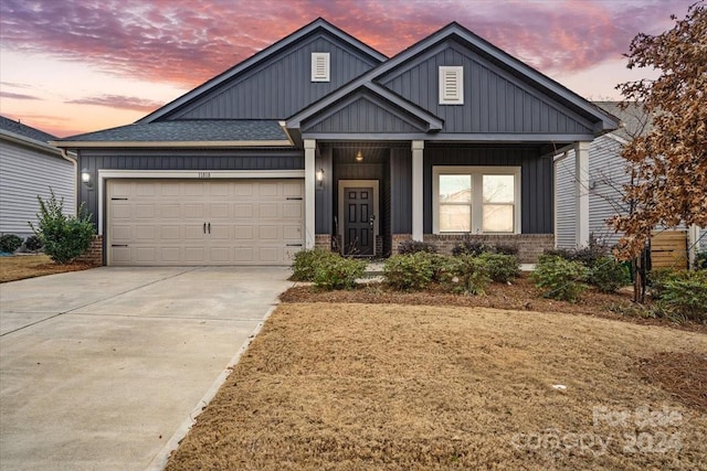 view of front of property with a garage