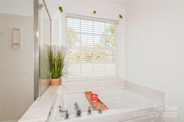 bathroom with a tub