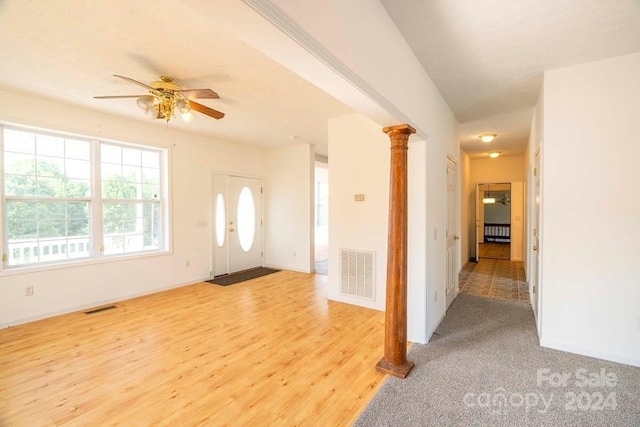 entrance foyer featuring ceiling fan and light hardwood / wood-style floors