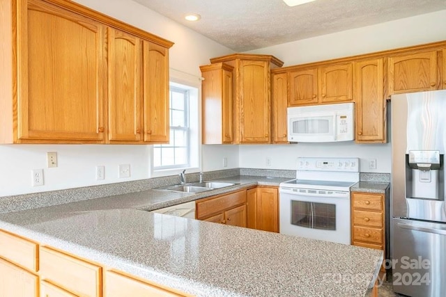 kitchen with sink and white appliances