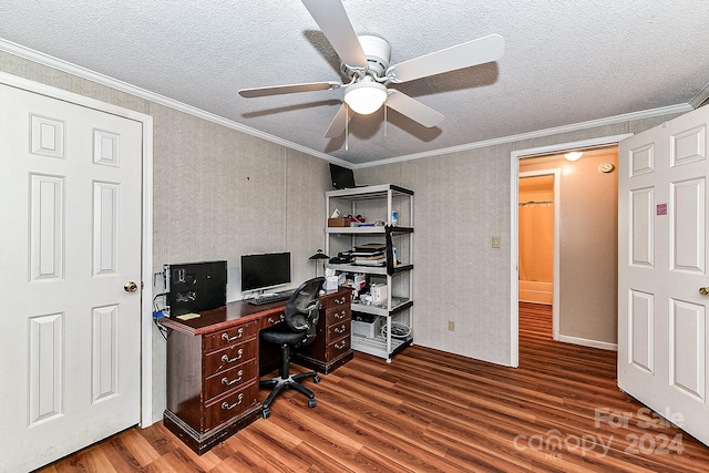 office area featuring a textured ceiling, ceiling fan, dark hardwood / wood-style floors, and ornamental molding