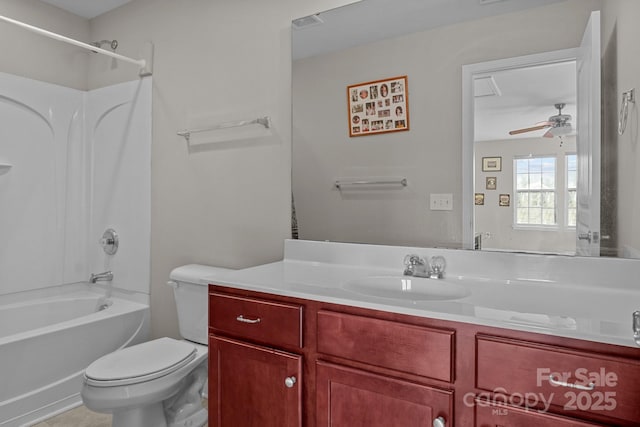 full bathroom featuring vanity, ceiling fan, toilet, and  shower combination