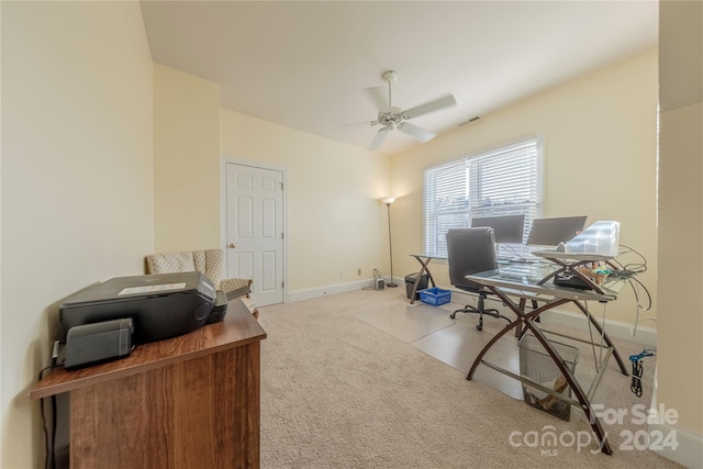 home office with light colored carpet and ceiling fan