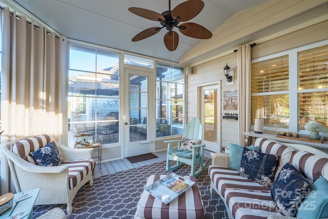 sunroom with vaulted ceiling and ceiling fan