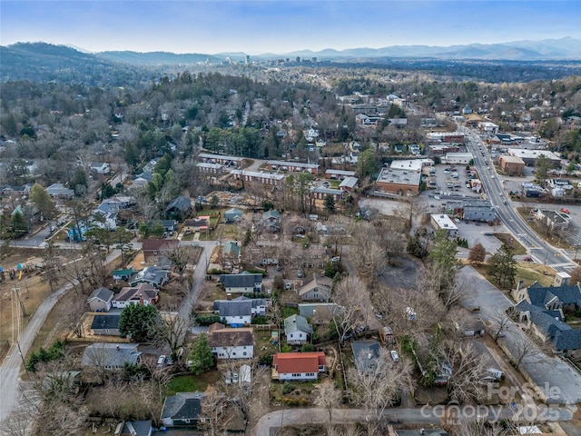 drone / aerial view featuring a mountain view