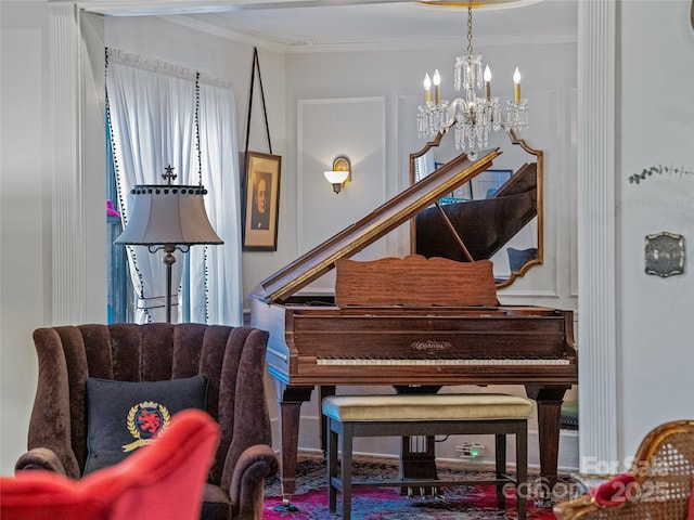 misc room featuring an inviting chandelier and ornamental molding