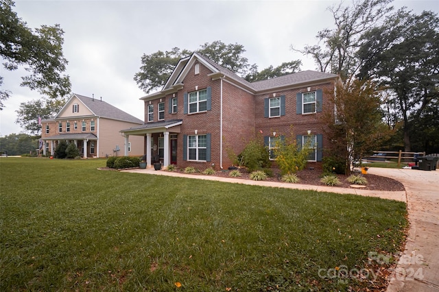 view of front of house with a front lawn