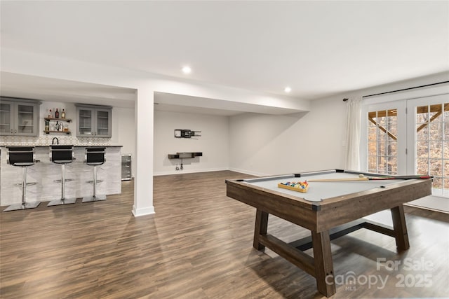 rec room featuring bar, pool table, beverage cooler, and dark hardwood / wood-style floors