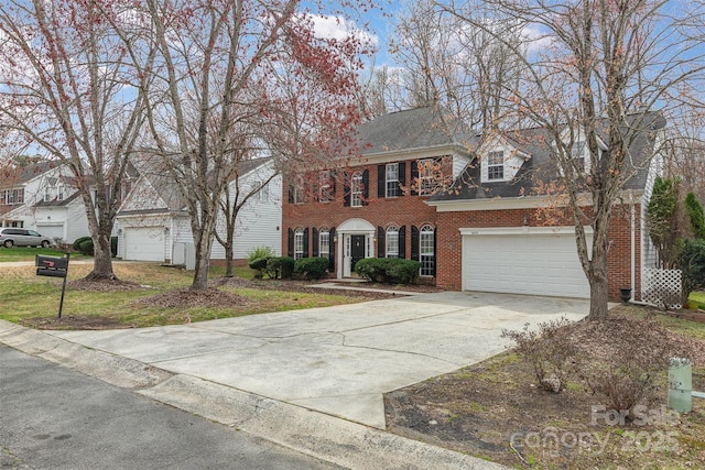 view of front of property featuring brick siding, an attached garage, concrete driveway, and a shingled roof