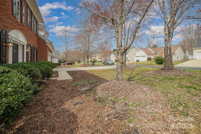 view of yard featuring a residential view