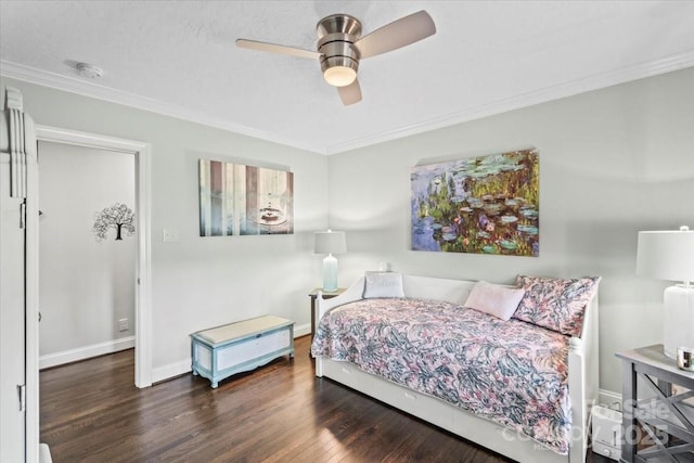 bedroom with ceiling fan, dark wood-type flooring, and ornamental molding