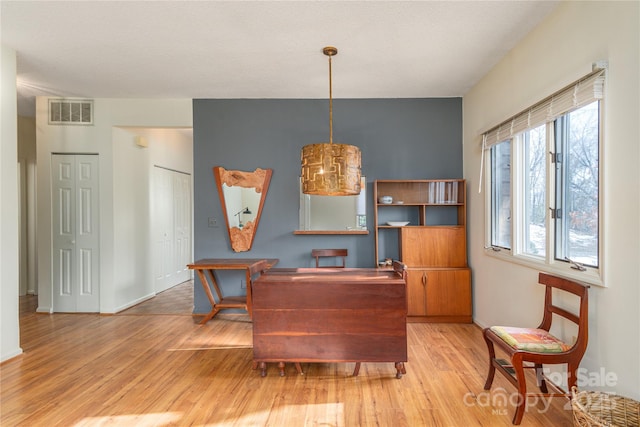 office space featuring light wood-type flooring