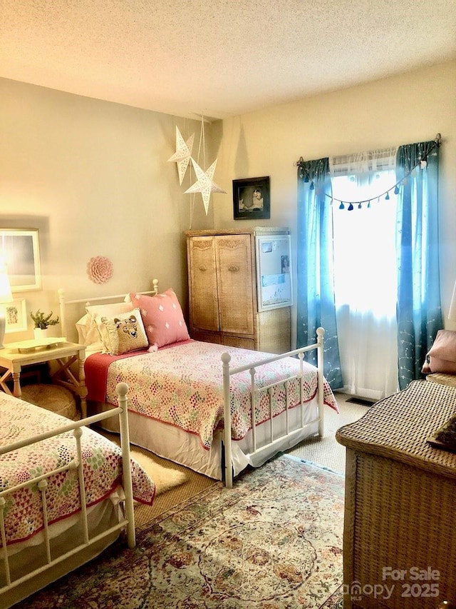 bedroom with a textured ceiling