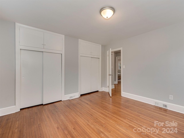 unfurnished bedroom with light hardwood / wood-style flooring