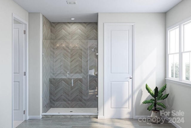 bathroom featuring walk in shower