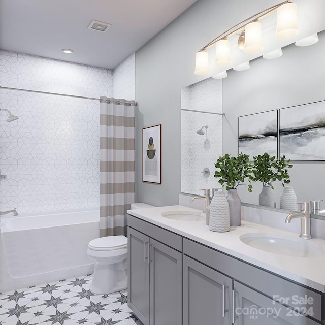 full bathroom with shower / tub combo with curtain, vanity, and toilet