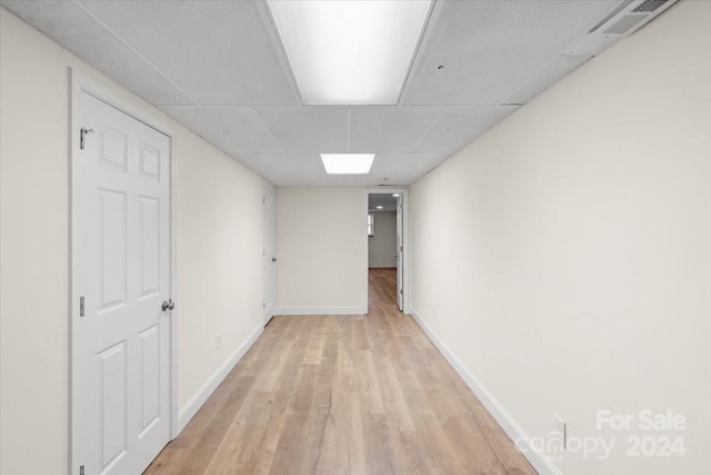 corridor featuring light hardwood / wood-style floors