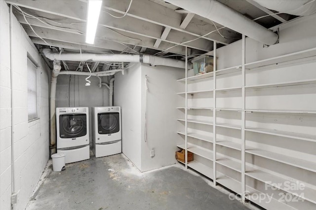 basement featuring washer and dryer