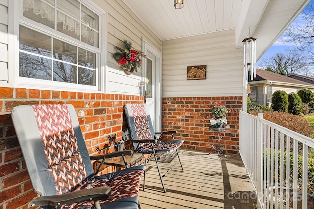 deck featuring covered porch