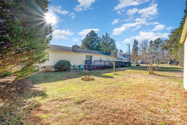 view of yard with a deck