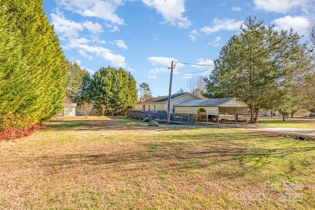 view of yard with a carport