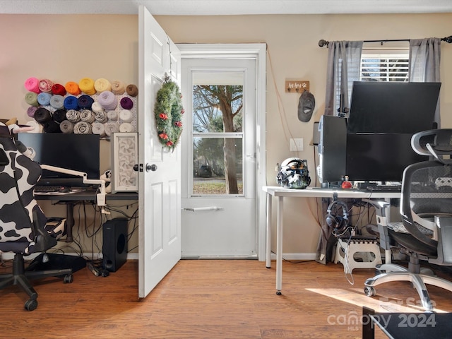 home office with light wood-type flooring