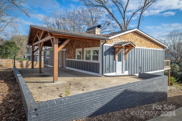 view of home's exterior with a patio area