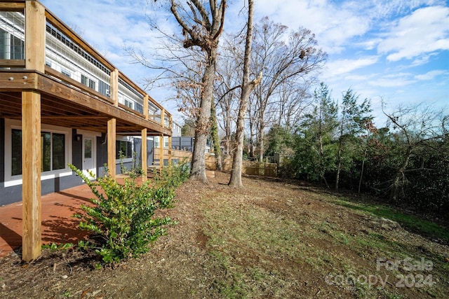 view of yard featuring a deck