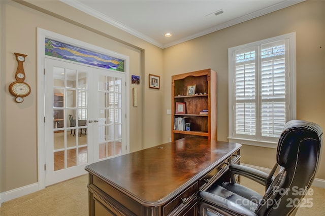 carpeted office with ornamental molding and french doors