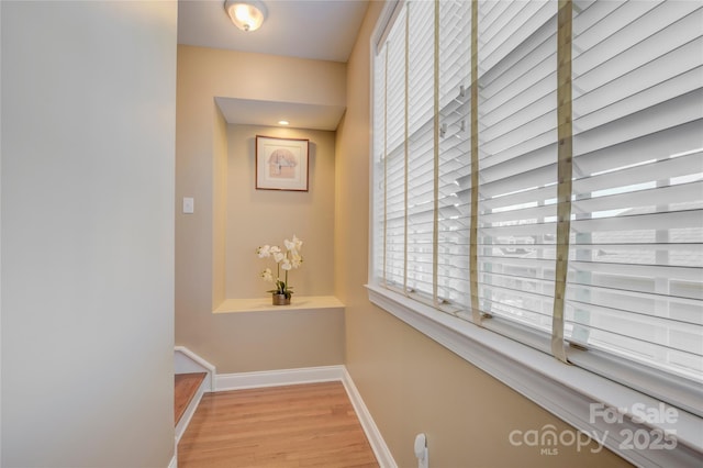 hall featuring light hardwood / wood-style flooring