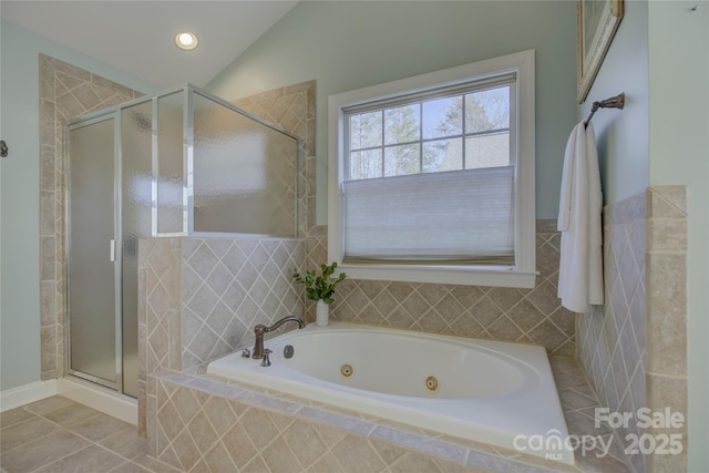 bathroom with tile patterned floors, lofted ceiling, and shower with separate bathtub